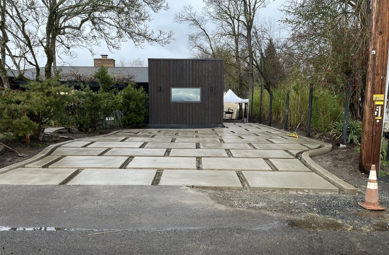 Concrete driveway panels at a residential entrance